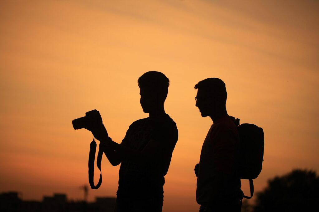 men, silhouettes, camera, photographer, sky, sunset, nature, outdoors, vacation, photography, orange sky, people, taking pictures, tourists, travellers